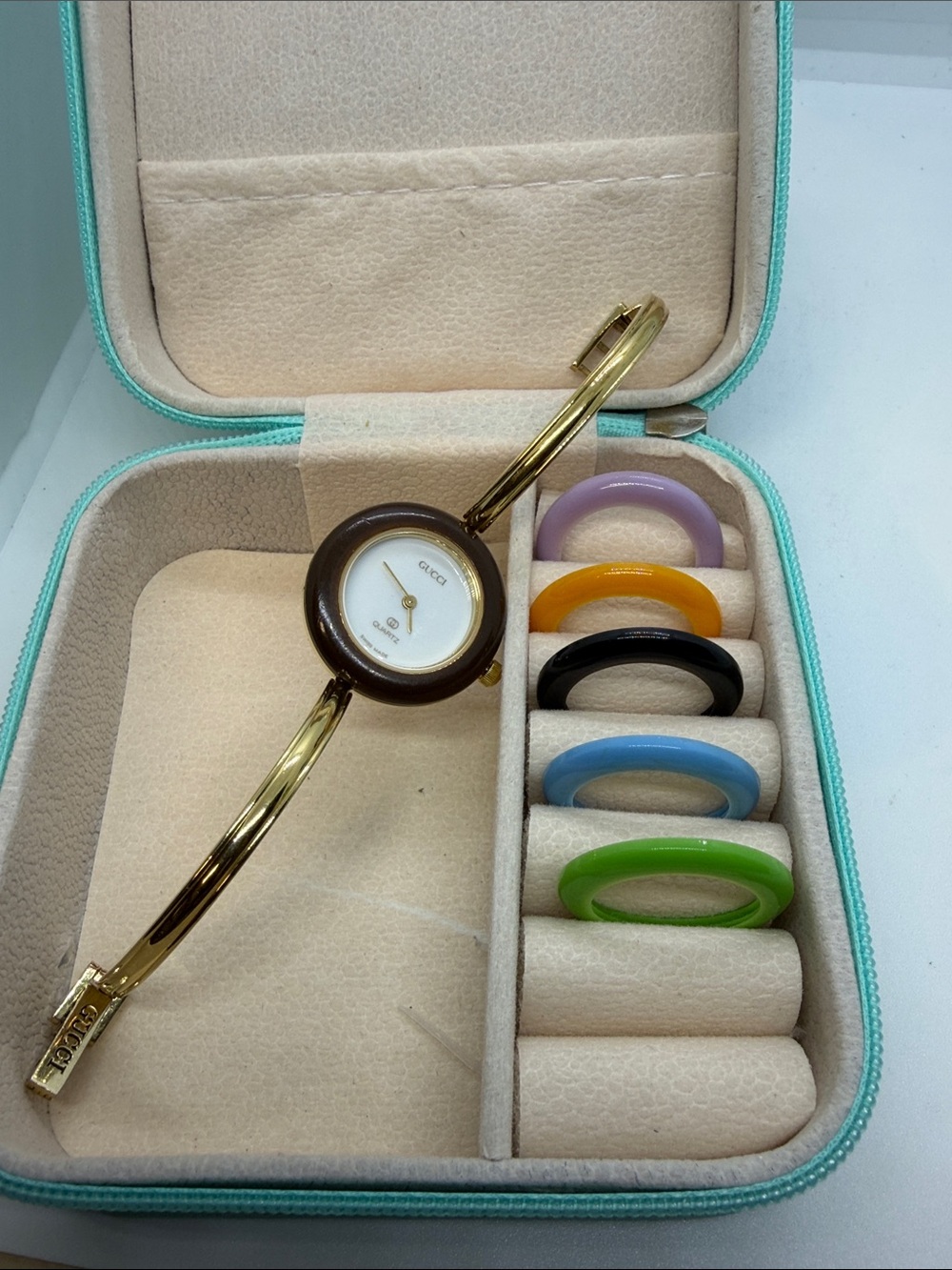 Gucci Gold-Tone Bangle Watch with Brown Bezel and Interchangeable Color Rings